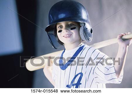 Boy in a baseball uniform View Large Photo Image Stock Photo - Boy in a baseball uniform. Fotosearch