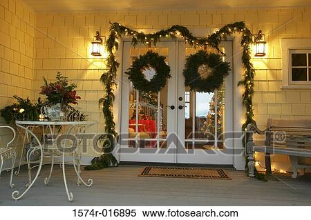 Stock Photography - Christmas decoration around an entrance door. Fotosearch