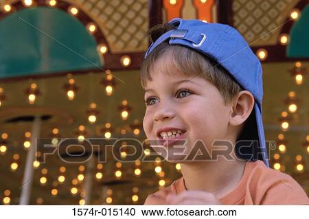 Close-up of a boy smiling View Large Photo Image Stock Image - Close-up of a boy smiling. Fotosearch