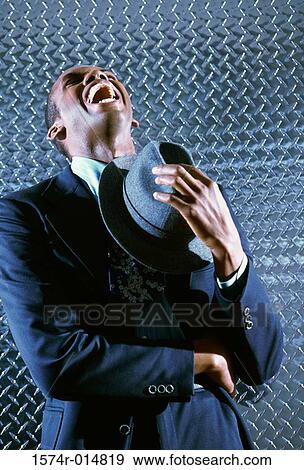 Close-up of a businessman laughing View Large Photo Image Stock Photo - Close-up of a businessman laughing. Fotosearch