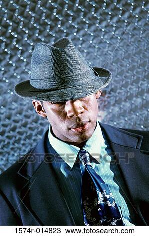 Stock Image - Close-up of a businessman looking serious. Fotosearch
