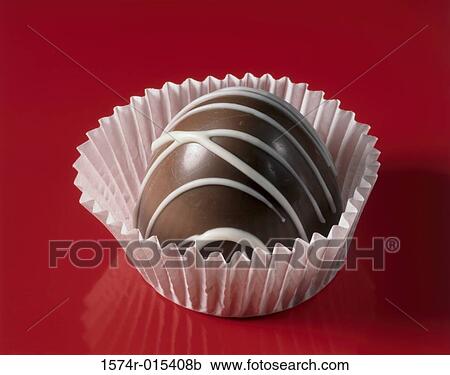 Close-up of a chocolate candy View Large Photo Image Stock Image - Close-up of a chocolate candy. Fotosearch