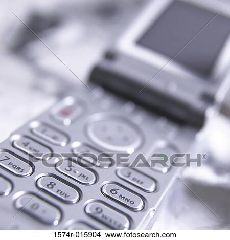 Close-up of a flip phone View Large Photo Image Picture - Close-up of a flip phone. Fotosearch