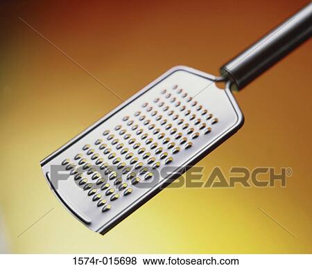 Close-up of a grater View Large Photo Image Stock Photo - Close-up of a grater. Fotosearch