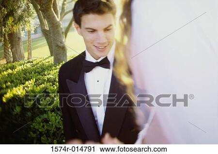 Close-up of a groom smiling View Large Photo Image Stock Image - Close-up of a groom smiling. Fotosearch