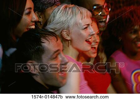 Close-up of a group of friends laughing together View Large Photo Image Stock Image - Close-up of a group of friends laughing together. Fotosearch