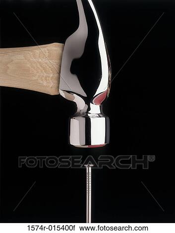 Close-up of a hammer hitting a nail View Large Photo Image Stock Image - Close-up of a hammer hitting a nail. Fotosearch