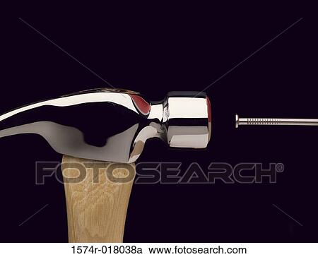 Close-up of a hammer hitting a nail View Large Photo Image Stock Image - Close-up of a hammer hitting a nail. Fotosearch