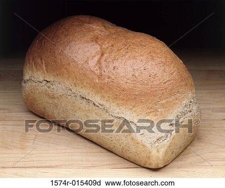 Close-up of a loaf of bread View Large Photo Image Stock Image - Close-up of a loaf of bread. Fotosearch