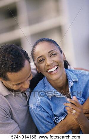 Close-up of a mature couple laughing View Large Photo Image Stock Photograph - Close-up of a mature couple laughing. Fotosearch