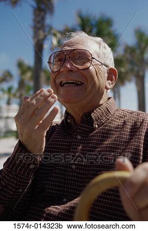 Stock Image - Close-up of a senior man smiling. Fotosearch