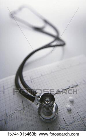 Close-up of a stethoscope on an ECG with pills View Large Photo Image Stock Image - Close-up of a stethoscope on an ECG with pills. Fotosearch