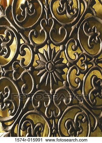 Close-up of a wrought iron grill View Large Photo Image Stock Image - Close-up of a wrought iron grill. Fotosearch