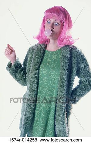 Close-up of a young woman blowing bubble gum View Large Photo Image Stock Photo - Close-up of a young woman blowing bubble gum. Fotosearch