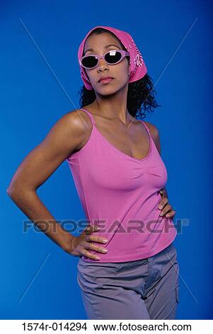 Close-up of a young woman posing View Large Photo Image Picture - Close-up of a young woman posing. Fotosearch