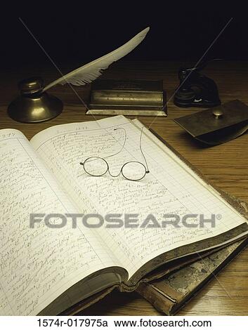 Close-up of an accounting ledger with eyeglasses and a quill pen, USA View Large Photo Image Stock Image - Close-up of an accounting ledger with eyeglasses and a quill pen, USA. Fotosearch