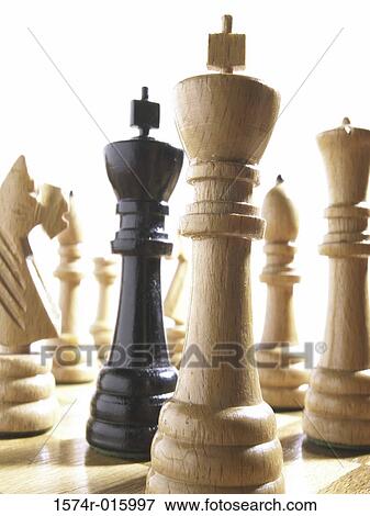 Close-up of chessmen on a chess board View Large Photo Image Stock Photo - Close-up of chessmen on a chess board. Fotosearch