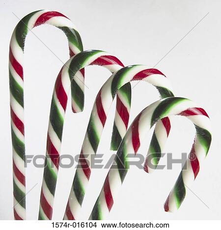 Picture - Close-up of four candy canes. Fotosearch