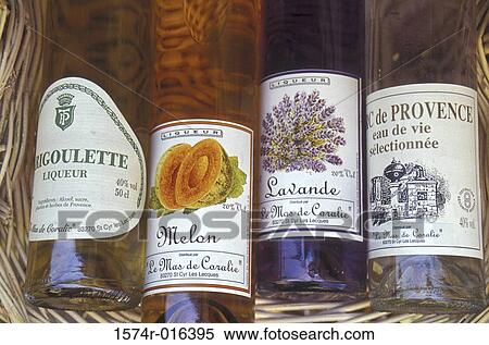 Close-up of four wine bottles View Large Photo Image Stock Photography - Close-up of four wine bottles. Fotosearch