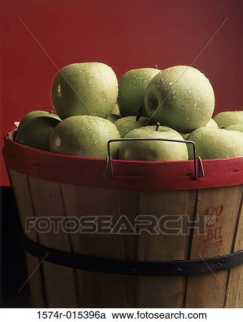 Close-up of green apples in a basket View Large Photo Image Stock Image - Close-up of green apples in a basket. Fotosearch