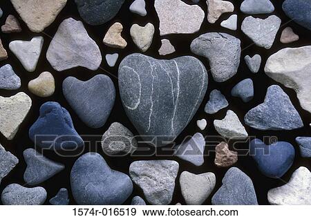 Close-up of heart shaped stones View Large Photo Image Stock Photo - Close-up of heart shaped stones. Fotosearch