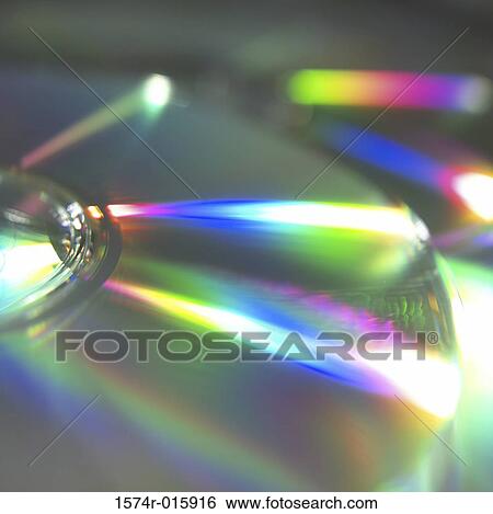 Close-up of two compact discs View Large Photo Image Stock Photograph - Close-up of two compact discs. Fotosearch