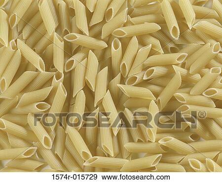 Stock Photo - Close-up of uncooked penne. Fotosearch