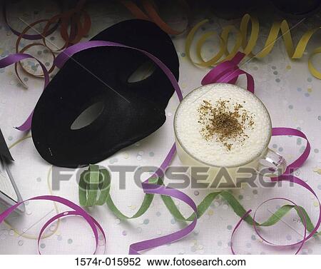 Confetti near an alcoholic beverage View Large Photo Image Stock Image - Confetti near an alcoholic beverage. Fotosearch