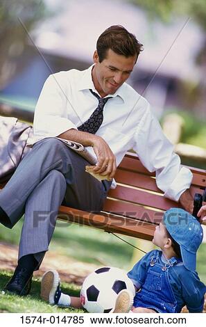 Father looking at his son View Large Photo Image Stock Photography - Father looking at his son. Fotosearch