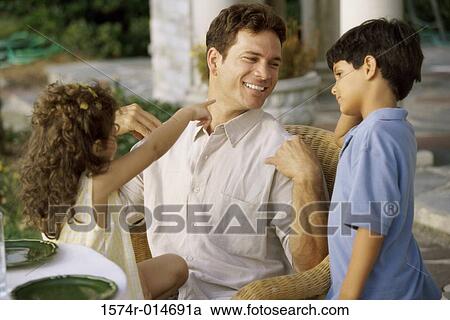 Father with his son and daughter View Large Photo Image Stock Image - Father with his son and daughter. Fotosearch
