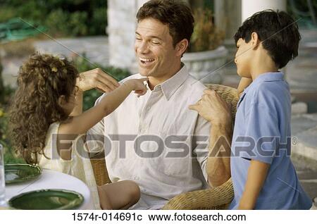 Father with his son and daughter View Large Photo Image Stock Image - Father with his son and daughter. Fotosearch