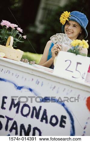 Girl making money at a lemonade stand View Large Photo Image Stock Image - Girl making money at a lemonade stand. Fotosearch