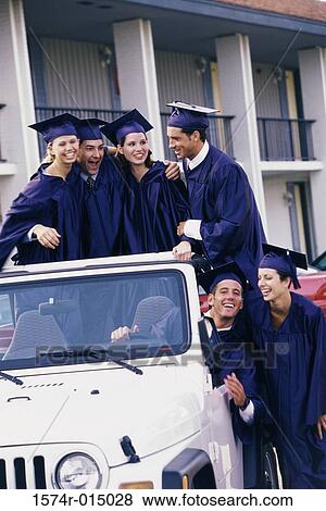Stock Photo - Group of college students celebrating their graduation. Fotosearch