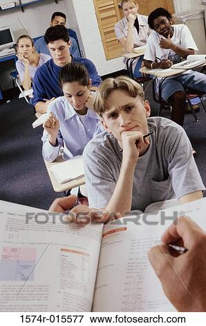 Group of high school students studying in a classroom View Large Photo Image Stock Photo - Group of high school students studying in a classroom. Fotosearch