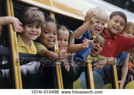 Group of students looking out of a school bus View Large Photo Image Stock Photo - Group of students looking out of a school bus. Fotosearch