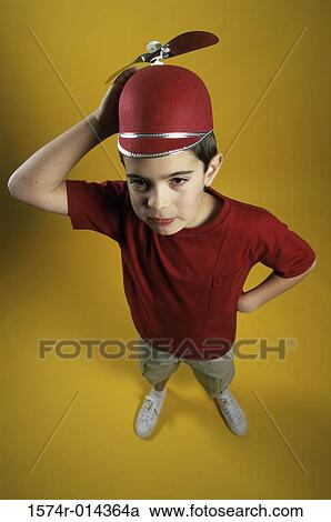 High angle view of a boy wearing a beanie View Large Photo Image Stock Image - High angle view of a boy wearing a beanie. Fotosearch