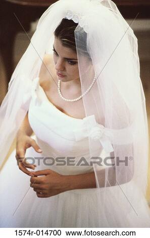 Stock Image - High angle view of a bride. Fotosearch