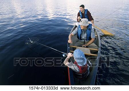 High angle view of a grandfather sitting with his son and grandson in a boat View Large Photo Image Stock Image - High angle view of a grandfather sitting with his son and grandson in a boat. Fotosearch