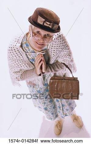 Stock Image - High angle view of a senior woman smiling. Fotosearch