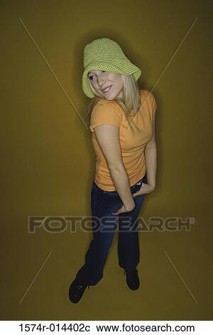 High angle view of a teenage girl smiling View Large Photo Image Stock Image - High angle view of a teenage girl smiling. Fotosearch