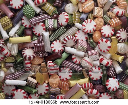 Stock Image - High angle view of assorted candies. Fotosearch