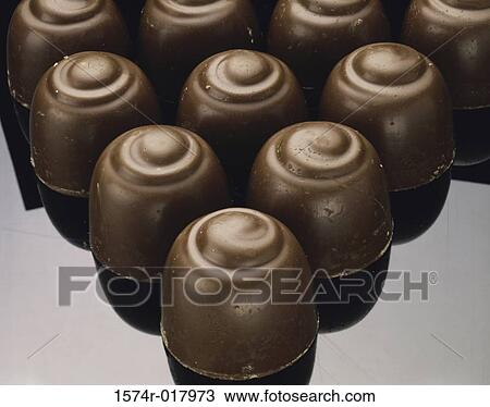 High angle view of assorted chocolate candies View Large Photo Image Stock Image - High angle view of assorted chocolate candies. Fotosearch