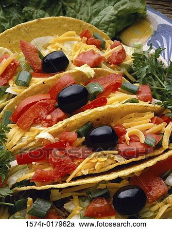High angle view of three tacos in a plate View Large Photo Image Stock Image - High angle view of three tacos in a plate. Fotosearch