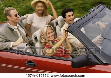 High angle view of two young couples sitting in car View Large Photo Image Stock Image - High angle view of two young couples sitting in car. Fotosearch