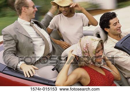 High angle view of two young couples sitting in car View Large Photo Image Stock Image - High angle view of two young couples sitting in car. Fotosearch