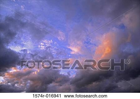 Low angle view of clouds in the sky View Large Photo Image Stock Image - Low angle view of clouds in the sky. Fotosearch