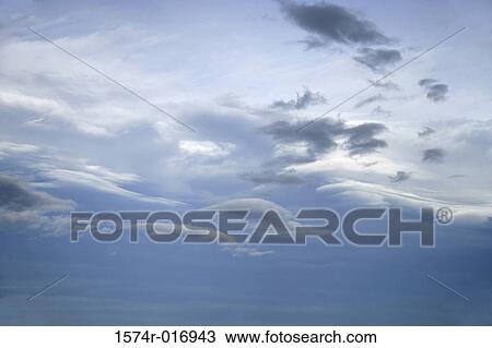 Low angle view of clouds in the sky View Large Photo Image Stock Image - Low angle view of clouds in the sky. Fotosearch