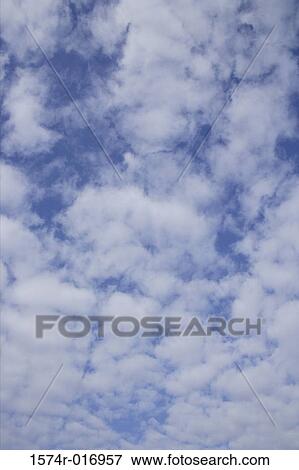 Low angle view of clouds in the sky View Large Photo Image Stock Photo - Low angle view of clouds in the sky. Fotosearch