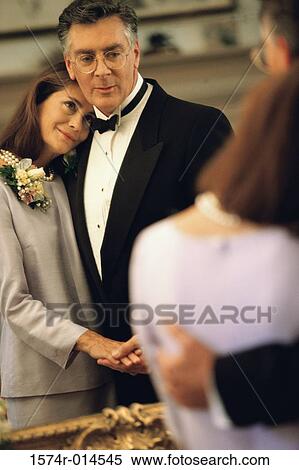 Mature couple embracing each other View Large Photo Image Stock Photography - Mature couple embracing each other. Fotosearch