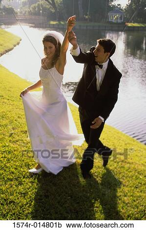 Newlywed couple dancing View Large Photo Image Stock Image - Newlywed couple dancing. Fotosearch